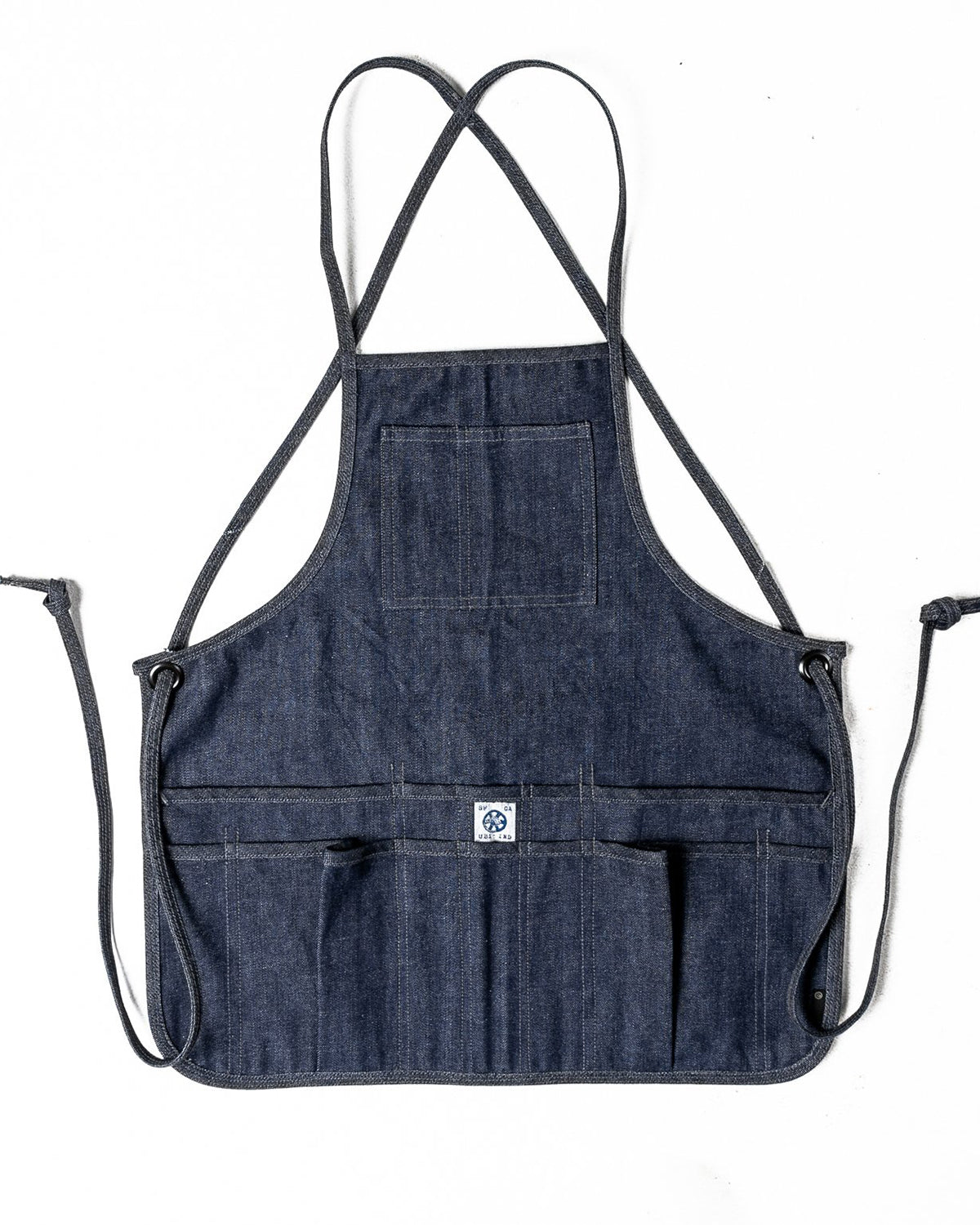 THE MID-LENGTH APRON - Raw Denim